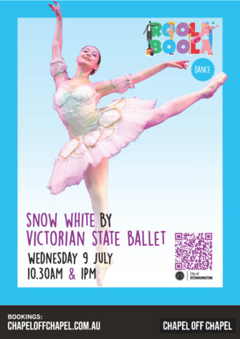 Image of a lone ballerina in a tutu with leg and arm out stretched