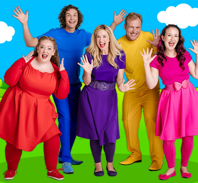 Members of Bounce Patrol standing together wearing colourful t-shirts