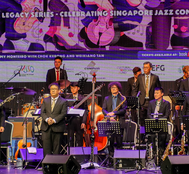 Musicians of the Jazz Association Singapore Orchestra standing on stage