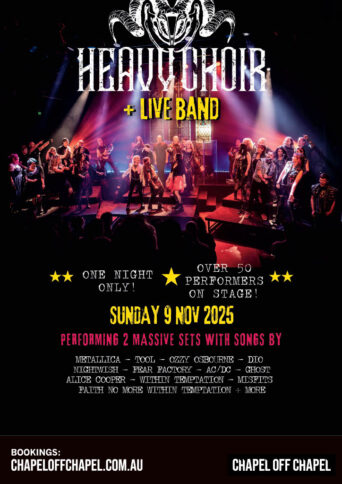 Members of Heavy Choir & Live Band performing onstage under spot lights