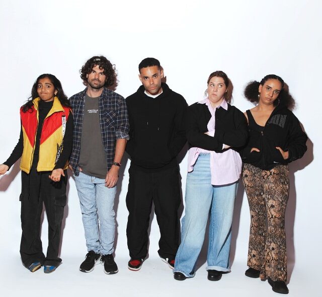 Full body shot of the five artists from Artefact standing alongside each other
