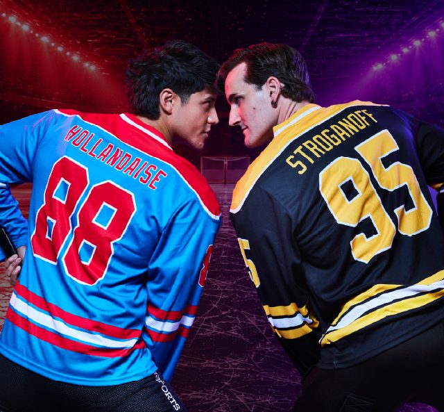 Two hockey players face off in a dramatic, head-to-head pose against a vibrant, purple-lit arena background.